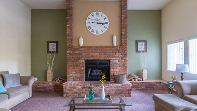 foothills clubhouse with cozy couches, and fireplace